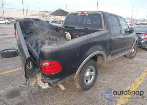 2002 Ford F-150 Lariat/Xlt z USA, uszkodzony, nr VIN 1FTRW07LX2KC53615